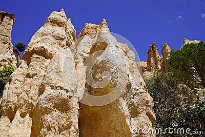 Limestone high chimneys formation geologic landscape in Orgues Ille sur Tet Languedoc in France Stock Photo
