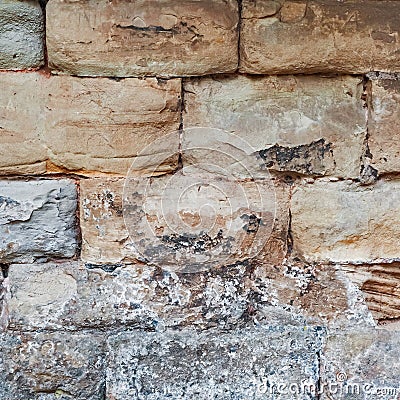 Limestone medieval wall of stone blocks texture background surface empty square closeup Stock Photo