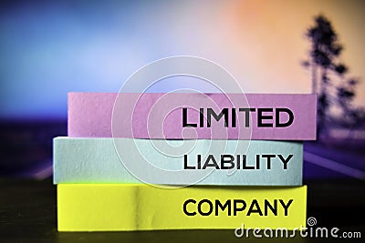 Limited Liability Company on the sticky notes with bokeh background Stock Photo