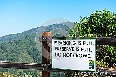 Limited Parking Space warning sign in the preserve of Midpeninsula Regional Open Space District - San Jose, California, USA - 2021 Editorial Stock Photo