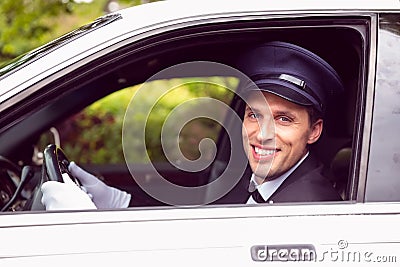 Limousine driver smiling at camera Stock Photo