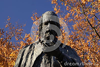 Lincoln, UK, 6th November, Tennyson Memorial and Statue in the grounds of Lincoln Cathedral Editorial Stock Photo