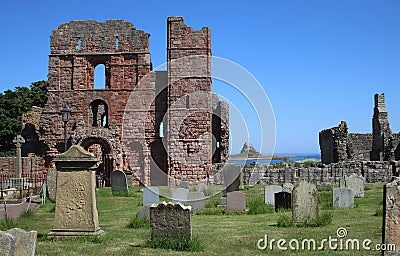 Lindisfarne Priory and Castle, Northumberland Stock Photo