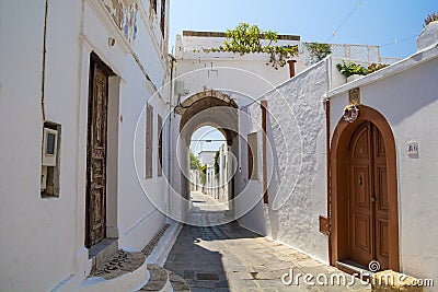 Lindos Gate in Narrow Street at Rhodes Island Editorial Stock Photo