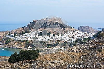 Lindos town cityscape and Lindos acropolis, Rhodes island, Greece Stock Photo