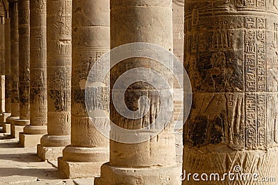 Line of stone pillars covered in hieroglyphics Stock Photo