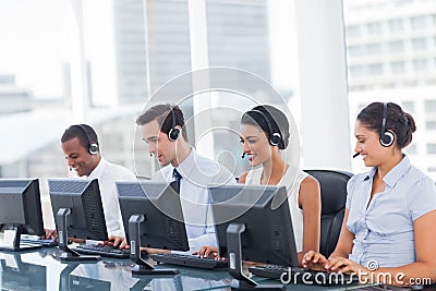 Line of call centre employees Stock Photo