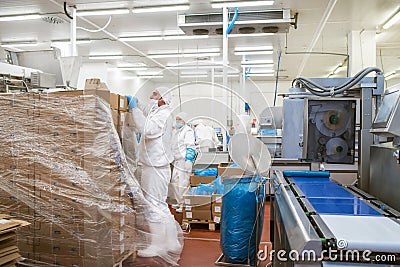 Line packing meat products, meat factory.Food Convenience food Editorial Stock Photo