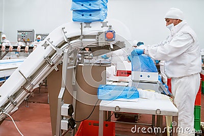 Line packing meat products, meat factory.Food Convenience food Editorial Stock Photo