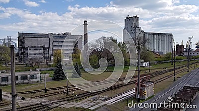 A line of railroad train tanker cars. Industrial Zone. empty wagons. Point on top Stock Photo