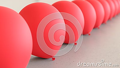 Linear Array of Red Balloons on a Light Gray Surface Stock Photo