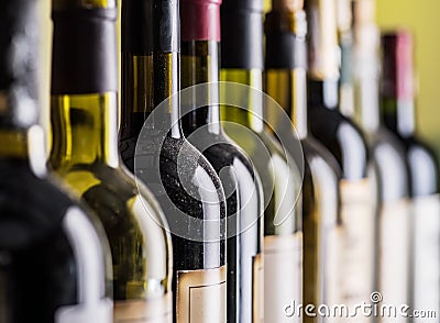 Line of wine bottles. Close-up. Stock Photo