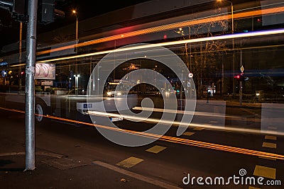 Linear light effect of a city bus Editorial Stock Photo