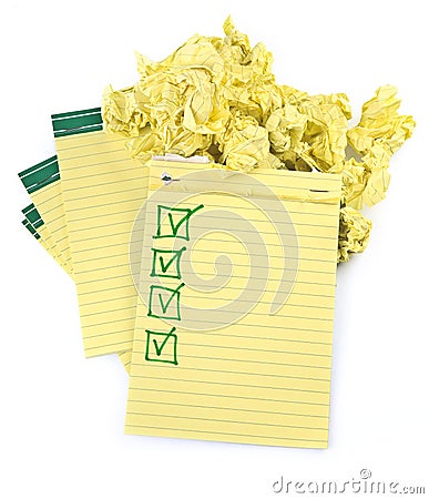 Lined paper notebooks with completed checklist Stock Photo