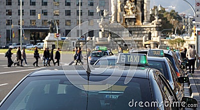 Lined up taxi cabs at Placa Espagna in Barcelona Stock Photo