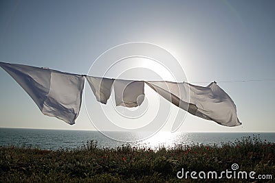 Linens dries in the fresh air Stock Photo