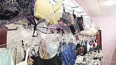 Lingerie shop. Shelves with goods. Brassieres, underpants and thermal underwear Stock Photo