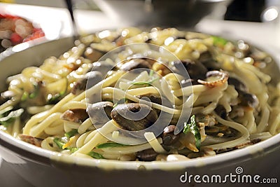 Linguini and clams with vegetables Stock Photo