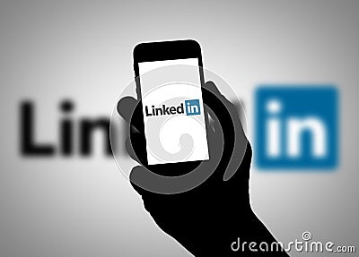 LINKEDIN mobile device with LinkedIn app Editorial Stock Photo