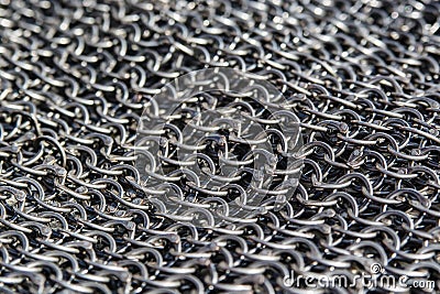 Links of chainmail. Metalic links background. Stock Photo