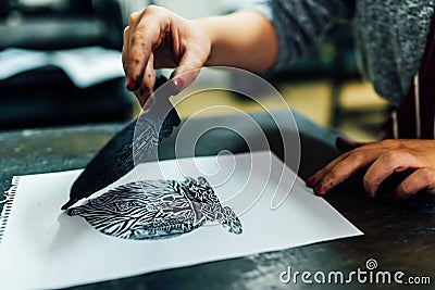 Linocut. manual printing on the machine Stock Photo