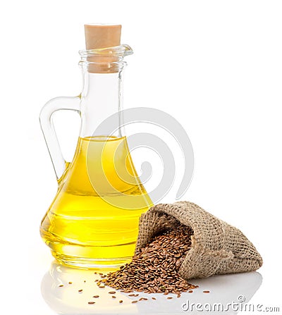 Linseed oil and flax seeds Stock Photo