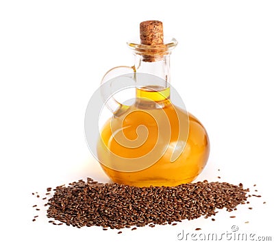 Linseed oil with flax seeds isolated on white background Stock Photo