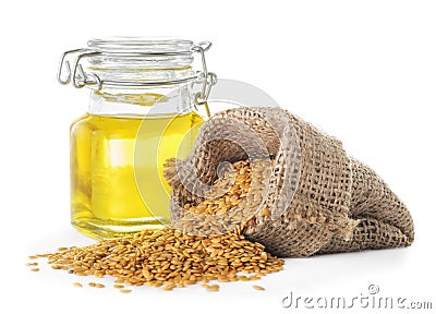 Linseed oil and golden flax seeds Stock Photo