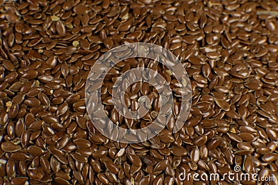 Brown Flax seed. Also known as Linseed, Flaxseed and Common Flax. Closeup of grains, background use Stock Photo