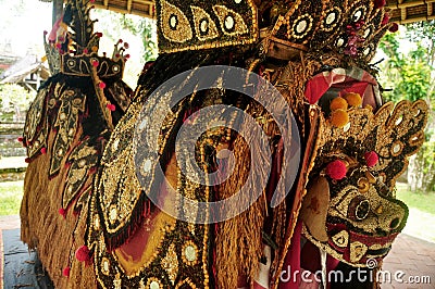 Lion costume bali style for indonesian people wear dancing in legong and barong waksirsa dance for show travelers people at Ubud Stock Photo