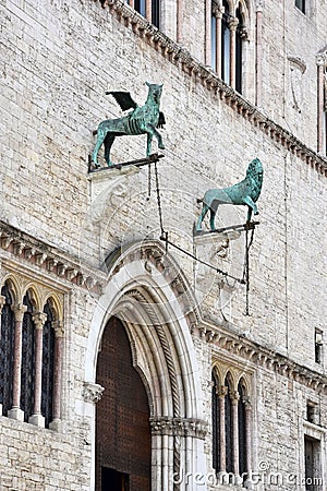 Lion and griffin , mythical creatures at Palazzo dei Priori in Perugia, Umbria Stock Photo