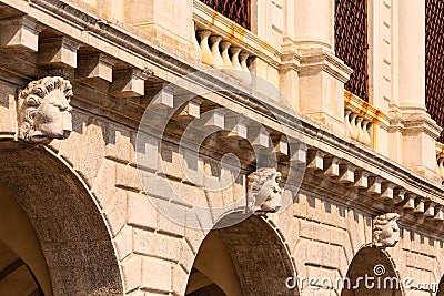 Lion Heads on Arches Stock Photo