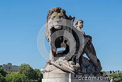 Lion a l'Enfant statue on Pont Alexandre III NW in Paris, France Stock Photo