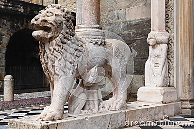 Lion on the porch of the Santa Maria Maggiore Cathedral in Bergamo, Italy Editorial Stock Photo