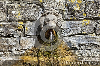 Lion's Head Drinking Fountain at the Chalice Well Stock Photo