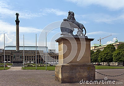 Lion sculpture with crest in front of the main entrance of the New Castle Neues Schloss in Germany, Stuttgart Stock Photo