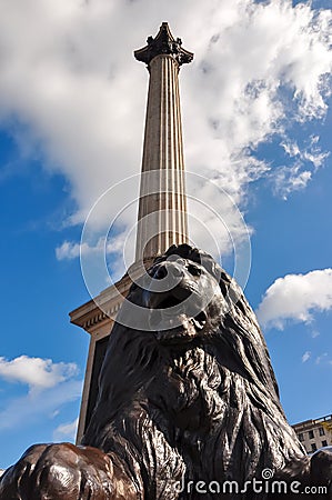 Lion sculpture and Nelson column on Trafalgar square, London, UK Editorial Stock Photo