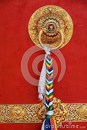 Lion shaped door handle in Buddhist temple Stock Photo