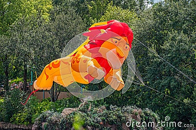 Lion shaped Kite flying through the air Editorial Stock Photo