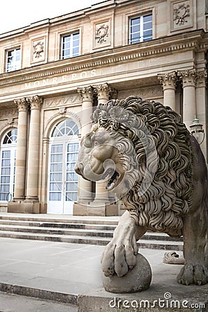 Lion statue in front of Monrepos Castle Stock Photo
