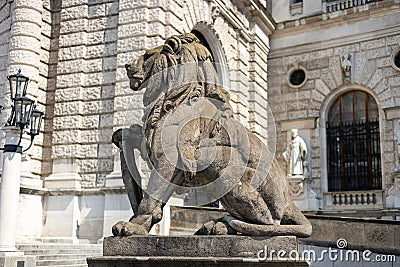 Lion statue at Hofburg palace on Heldenplatz square in Vienna, Austria Stock Photo