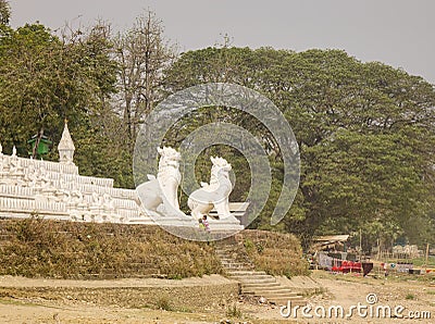 Lion statues at Buddhist temple in Mandalay, Myanmar Editorial Stock Photo