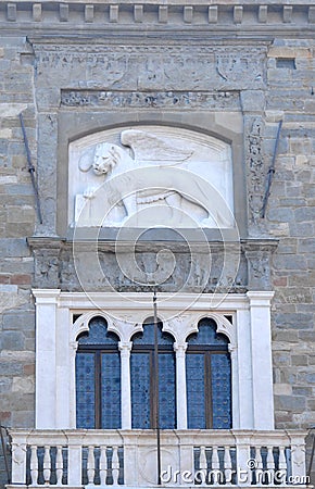 Lion of Venice over three windows Stock Photo