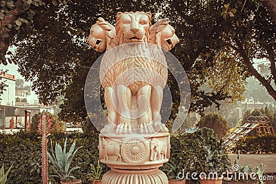 Lions on sculptured national emblem of India. Copy of the ancient Ashoka Pillar of Sarnath Stock Photo