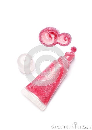 Lip gloss pink color from tube on white background Stock Photo