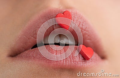 Lip with hearts. Love concept. Hearts sweet makeup. Beauty lovely lips. Lipscare. Stock Photo