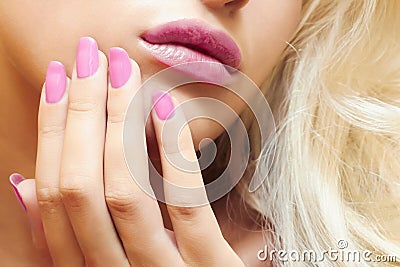 Lips,nails and hair of beautiful blond woman. Stock Photo