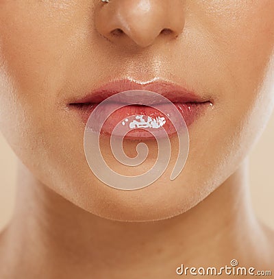 Lips, skincare and woman with lipstick for cosmetics, gloss and wellness for clear, smooth and glow skin. Natural beauty Stock Photo