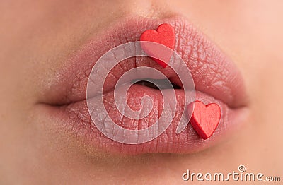 Lipscare. Lip with hearts. Love. Hearts sweet makeup. Beauty lovely lips. Stock Photo