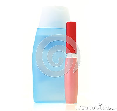 Lipstick gloss pink and Lotion Bottle Stock Photo